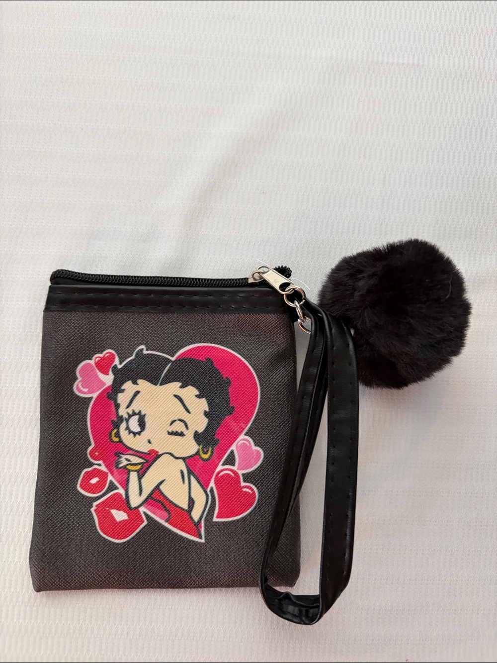 Pick (1) Betty Boop Mini Wristlets with matching pompom
3 1/2” x 4 1/2” - Picture 5 of 5